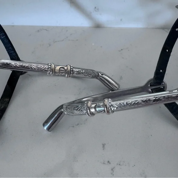 Engraved English 1” spurs by Holly Spagnola with initial C